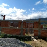 Ubatuba, Jardim Carolina - Terreno em condomínio fechado com 500 m2, aterrado,