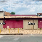 Casa com 3 quantos, 2 banheiros e um Barracão no fundo.