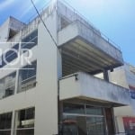 Prédio comercial novo, com 5 pavimentos e  550 m² de área construída.