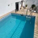 Cobertura ampla vista livre com piscina e churrasqueira