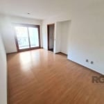 Vende-se apartamento com 2 dormitórios e 1 suíte, living 2 ambientes com sacada e 2 vagas de garagem. Vista arborizada, piso tábuão, cozinha e área de serviço amplas, dependência completa, 1 banheiro 