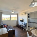 Apartamento semimobiliado de 57m², 2 dormitórios, sendo 1 suíte, living para 2 ambientes, cozinha americana, área de serviço integrada, 1 banheiro social e 1 vaga de garagem coberta e escriturada. Imó