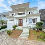 Casa Condominio em Porto Alegre, no bairro Hípica, com 5 dormitório(s), e 5 banh