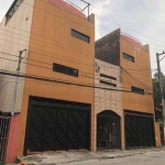 terreno com 11 casas construídas