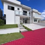 Casa com 4 dormitórios à venda, 193 m² por R$ 1.590.000,00 - Condomínio Flora Rica - Peruíbe/SP