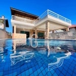 Casa com 5 dormitórios à venda, 339 m² por R$ 2.500.000,00 - Bougainvillee I - Peruíbe/SP