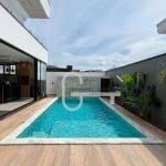 Casa com 4 dormitórios à venda, 320 m² por R$ 2.500.000,00 - Condomínio Flora Rica - Peruíbe/SP