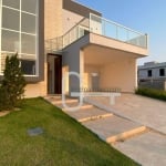 Casa com 4 dormitórios à venda, 184 m² por R$ 1.120.000,00 - Condomínio Flora Rica - Peruíbe/SP