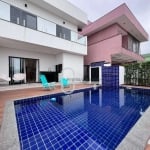 Casa com 4 dormitórios à venda, 207 m² por R$ 1.450.000,00 - Condomínio Flora Rica - Peruíbe/SP