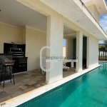 Casa com 4 dormitórios à venda, 518 m² por R$ 3.500.000,00 - Condomínio Flora Rica - Peruíbe/SP