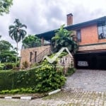 Casa tipo sobrado no Morro Santa Terezinha com 400m² de área construída.