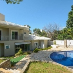 Casa em condomínio fechado à venda 5 quartos, sendo (4 suítes), piscina no Cacupé, Florianópolis/SC