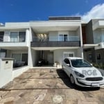 Excelente casa em condomínio a venda de porteira fechada com 200 m² de área privativa 3 dormitórios no bairro Hípica, Zona Sul de Porto Alegre.&lt;BR&gt;&lt;BR&gt;Casa com 03 dormitórios sendo uma suí