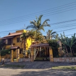 Casa 5 dormitórios, 3 suítes, varanda, 4 vagas de garagem, no bairro Hípica, Porto Alegre/RS.  &lt;BR&gt;   &lt;BR&gt;  &lt;BR&gt;Casa no Loteamento Nova Ipanema, com 250m² de área construída e 693m² 