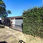 Ótima casa de esquina no bairro Teresópolis, com 3 dormitórios, sendo uma suíte, lavabo, banheiro social, cozinha americana, amplo living, lavanderia fechada, garagem para 4 carros, sendo duas coberta