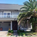 Descubra esta incrível casa no Condominio Porto Coronado, localizada na Avenida Interbalneários, 436, em Xangri-Lá. Com uma ampla área privativa de 248 m², esta residência é perfeita para quem busca c