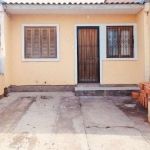 Casa 2 dormitórios | garagem | vende casa 2 dormitórios , living amplo com estar e jantar , quartos amplos , local para carro na frente do imóvel e amplo pátio nos fundos . Local próximo ao zaffari ju