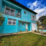 Casa com 4 quartos, suítes, vaga de garagem, no bairro Vila Nova, Porto Alegre/RS &lt;BR&gt; &lt;BR&gt;Esta casa moderna e espaçosa oferece 4 dormitórios, sendo 2 suítes privativas e 2 quartos com suí