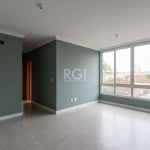 Apartamento  2 dormitórios com uma rea privativa 61,12m² ,sendo 1 suíte, living para 2 ambientes ampla janela com peitoril de vidro ampliando, cozinha americana com bancada, churrasqueira e ótimo acab