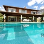 Casa com 4 suítes no Condomínio Terra Ville!&lt;BR&gt;Ótima casa com 516m2 construdos e  vista deslumbrante para o lago e Campo de golfe do condomínio..&lt;BR&gt;&lt;BR&gt;Amplo Living com lareira e  