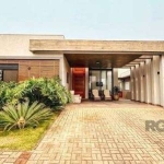 ua oportunidade de viver com estilo, conforto e exclusividade chegou! Esta linda casa no Condomínio Sea Cost oferece um lar sofisticado e acolhedor, com 175m² de área privativa e 4 suítes espaçosas, t