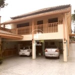 Casa térrea com 4 Dormitórios, sendo 1 Suíte e 8 Vagas de Garagem no Bairro Jardim Bela Vista - Santo André/SP. Aceita permuta.