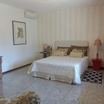 Casa com 4 dormitórios à venda, 230 m² por R$ 2.600.000,00 - Acapulco - Guarujá/SP