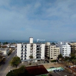 Cobertura com vista panorâmica na praia da enseada.