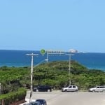 Apartamento com 130m², Vista Mar, sacada com churrasqueira, 3 quartos e 2 vagas de garagem.