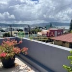 Terraço com vista mar e churrasqueira, piscina, semi mobiliado e 5 quartos à venda em Coqueiros.