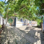 À venda na Praia do Campeche! Casa com 3 quartos em localização privilegiada.