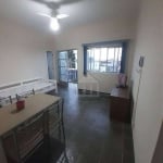 Apartamento para venda com sacada e vaga de garagem no Guarujá/SP