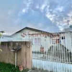 Vende-se terreno no Cajuru com 3 casas- Aceita permuta como parte do pagamento