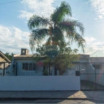 Vendo casa 3 dormitórios, com churrasqueira e 4 vagas de garagem no Bairro Vila Márcia em Cachoeirinha RS