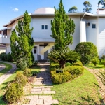 Casa em condomínio à venda em Sousas, com 6 suítes (2 térreas), espaço gourmet e garagem para 10 carros.