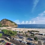 NO CORAÇÃO DA AVENIDA ATLÂNTICA 416, UM ELEGANTE APARTAMENTO SE ERGUE FRENTE À DESLUMBRANTE PRAIA DO