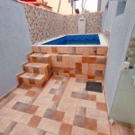 Casa em condomínio com 2 dormitórios e piscina à venda, por R$ 315.000 - Cibratel II - Itanhaém/SP