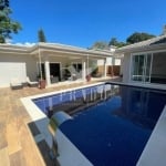 CASA TÉRREA ALTO PADRÃO NO CONDOMÍNIO FLAMBOYANT COM 5 SUÍTES, PISCINA E 490M2 - ATIBAIA/SP