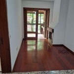 Apartamento 1 dormitório com vaga/box/garagem escriturada; imóvel de frente, sacada integrada com churrasqueira, lareira, piso taboão no living e laminado no dormitório, cozinha americana, banheiro so