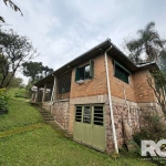 Imóvel á venda no bairro Cascata em Porto Alegre/RS | Casa com 3 dormitórios sendo 1 suite, sala de estar, cozinha, banheiro social, área de serviço, churrasqueira, garagem coberta e amplo terreno arb