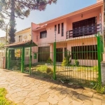 Casa com 5 quartos à venda na Rua Monteiro Lobato, 395, Partenon, Porto Alegre