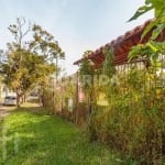 Casa com 3 quartos à venda na Rua dos Guenoas, 1113, Guarujá, Porto Alegre