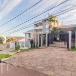 Casa com 4 quartos à venda na Rua Curupaiti, 113, Cristal, Porto Alegre