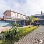 Casa com 4 quartos à venda na Rua Jerolomo Minuzo, 317, Vila Nova, Porto Alegre