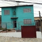 Casa com 4 quartos à venda na Avenida Delmar Rocha Barbosa, 729, Rubem Berta, Porto Alegre