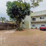 Casa com 3 quartos à venda na Rua Jerolomo Minuzo, 464, Vila Nova, Porto Alegre