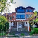 Casa com 3 quartos à venda na Rua Ponciano Pacheco da Silveira, 114, Guarujá, Porto Alegre