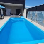 EXCELENTE CASA COM PISCINA A POUCOS METROS DA PRAIA - NOVA