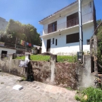 Amplo terreno de frente no bairro Nossa Senhora de Lourdes.