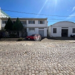 Casa comercial excelente localização com loja e pavilhão